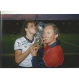 Autographed 12 x 8 photo, MEL STERLAND, a superb image depicting Sterland and physio Fred Street