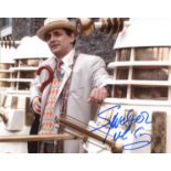 Doctor Who. 8 x 10 inch photo signed by Doctor Who himself, actor Sylvester McCoy. Good Condition.