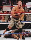 John Cena WWE Signed 8 x 10 inch Photo. Good Condition. All signed pieces come with a Certificate of