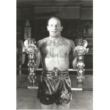 Sir Henry Cooper signed 7x5 b/w photo. (3 May 1934 - 1 May 2011) was an English heavyweight boxer.