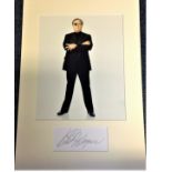 Robert Wagner signature piece mounted below colour photo. Approx overall size 16x12. Good Condition.