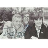 Hank Marvin, Bruce Welch and Brian Bennett signed 6x4 b/w The Shadows postcard. Good Condition.