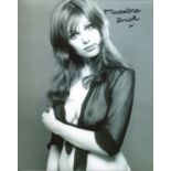 Bond Girl. 8 x 10 inch photo signed by Bond girl Madeline Smith, pictured in sexy see through top!