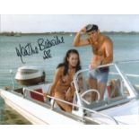 Bond Girl. 8 x 10 inch photo from the Bond movie Thunderball signed by actress Martine Beswick. Good