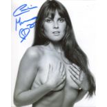 Caroline Munro. 8 x 10 inch photo signed by Bond girl Caroline Munro pictured in a sexy pose. Good