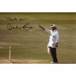Dickie Bird. 8x12 inch photo signed by former cricket umpire Dickie Bird, picture giving a batsman