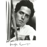 Hugh Grant - 6x4; black and white image of Grant leaning out of a car window, signed in black.