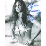 Bond Girl. 8 x 10 inch photo signed by Bond girl Caroline Munro pictured in a sexy swimsuit. Good