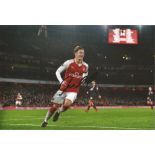 Football MESUT OZIL signed Arsenal 8x12 Photo. Good Condition. All signed pieces come with a