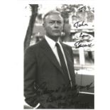 Edward Woodward signed 10x8 b/w photo. Dedicated. Good Condition. All signed pieces come with a