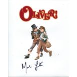 Mark Lester. 8 x 10 inch photo from the musical film Oliver signed by actor Mark Lester. Good