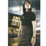 Naoko Mori signed 10x8 colour photo. Good Condition. All signed pieces come with a Certificate of