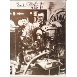 Sir Frank Whittle signed 7 x 5 b/w photo shown in his factory. Good Condition. All signed pieces