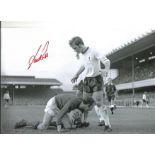 Autographed 12 x 8 photo, IAN ROSS, a superb image depicting Arsenal goalkeeper Bob Wilson saving at