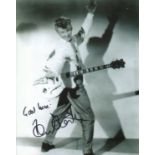 Tommy Steele. 8 x 10 inch photo signed by pop legend Tommy Steele. Good Condition. All signed pieces