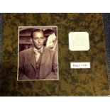 Bing Crosby signature piece mounted alongside b/w photo. Approx. overall size 12x10. Harry Lillis