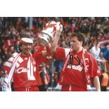 Autographed 12 x 8 photo, STEVE NICOL, a superb image depicting Nicol and his Liverpool team mate