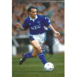 Pat Nevin Signed Everton 8x'12 Photo. Good Condition. All signed pieces come with a Certificate of