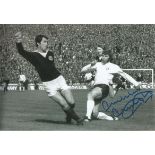 Autographed 12 x 8 photo, MALCOLM MacDONALD, a superb image depicting the England forward in a