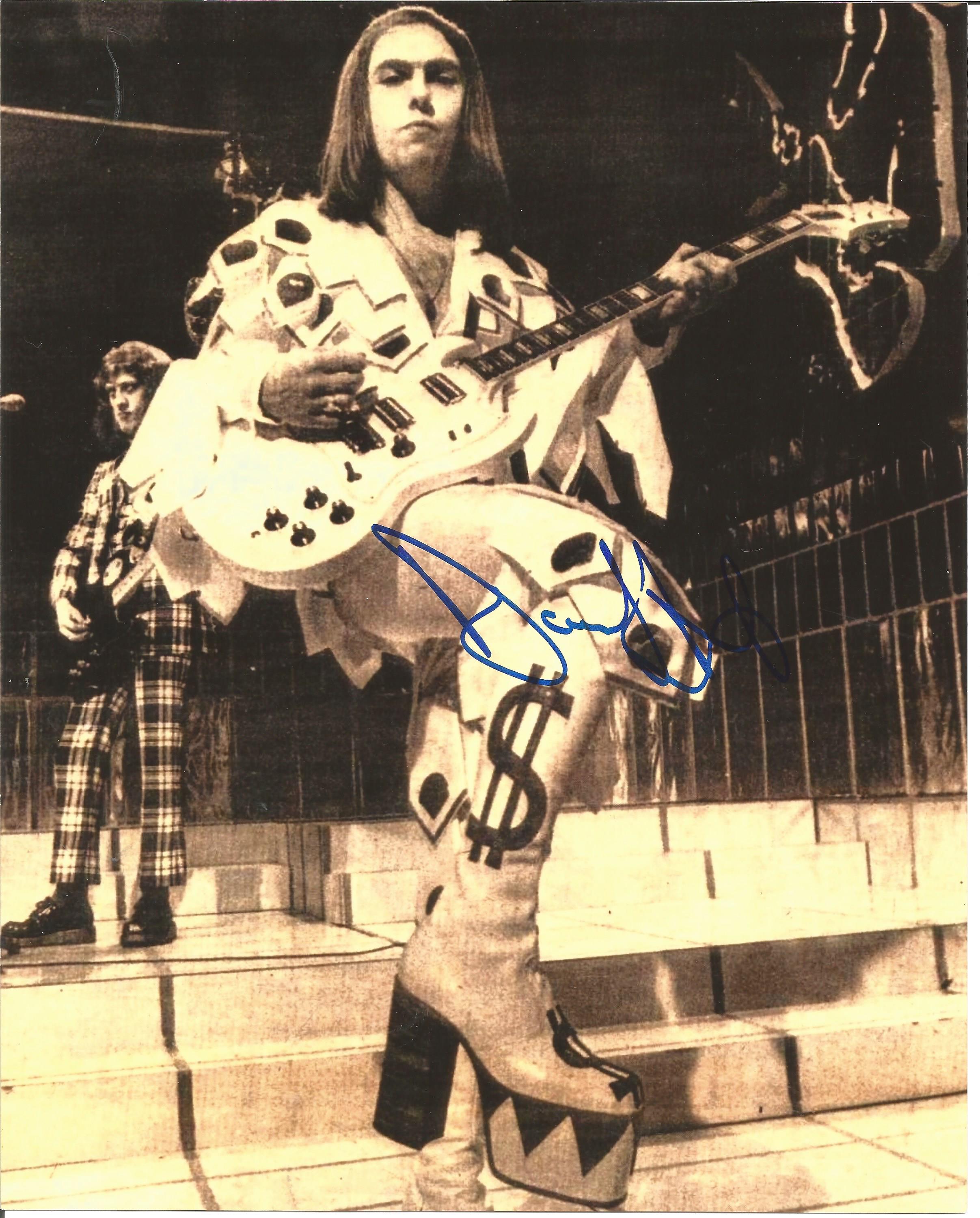 Dave Hill signed 10x8 b/w photo. Good Condition. All signed pieces come with a Certificate of