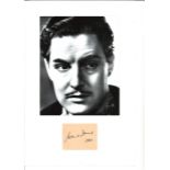 Robert Donat signature piece dated 1942 mounted below b/w photo. Approx overall size 16x12. Good