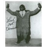 Fats Domino signed 6x4 b/w photo. Good Condition. All signed pieces come with a Certificate of