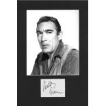 Anthony Quinn signature piece mounted below b/w photo. Approx overall size 16x11. Good Condition.