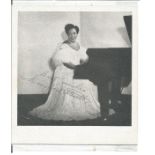 Winifred Atwell signed 5 x 5 portrait photo sitting in long white dress at the piano. Comes with