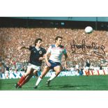Autographed 12 x 8 photo, TREVOR BROOKING, a superb image depicting the England forward being