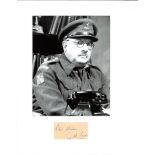 Arthur Lowe signature piece mounted below b/w photo as Captain Mainwaring in Dad's Army. Approx.