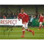 Tyler Roberts Signed Leeds & Wales 8x'10 Photo. Good Condition. All signed pieces come with a