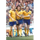 Autographed 12 x 8 photo, BRIAN TALBOT, a superb image depicting Arsenal's Price and Brady