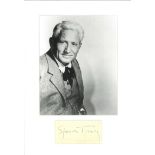 Spencer Tracy signature piece mounted below b/w photo. Approx overall size 14x11. Good Condition.