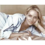 Uma Thurman signed 10x8 colour photo. Good Condition. All signed pieces come with a Certificate of