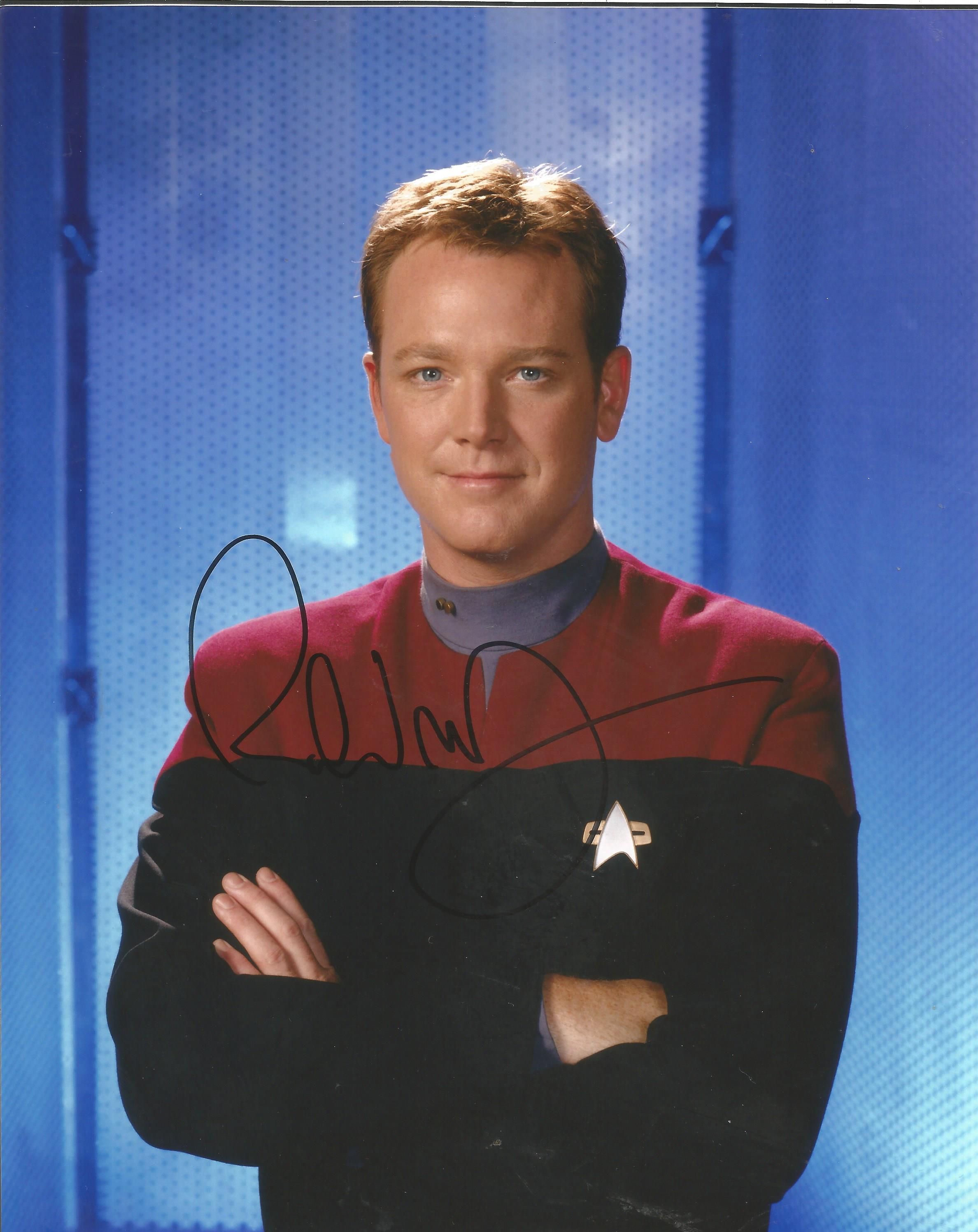 Movies and TV Robert Duncan McNeill signed 10x8 Star Trek colour photo. Good Condition. All signed