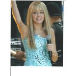 Music Miley Cyrus 10x8 signed colour photo. Miley Ray Cyrus is an American singer, songwriter, and