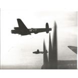 RAF 138 Squadron Lancaster MK III Bomber b/w vintage photo pictured in flight in Mar 1945. Good