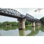 BRIDGE OVER THE RIVER KWAI: 8x12 inch photo of the Bridge over the River Kwai signed by former POW