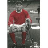 Autographed 12 X 8 Photo, Tony Dunne, A Superb Image Depicting Dunne Posing With The European Cup