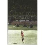 Multi signed Bobby Charlton autobiography. Signed on inside page by Geoff Hurst, Martin Peters,