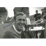 Autographed 12 X 8 Photo, Pat Crerand, A Superb Image Depicting Crerand Posing With The European Cup