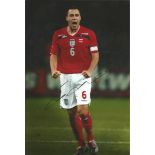 John Terry Signed England 8x12 Photo. Good Condition. All signed pieces come with a Certificate of