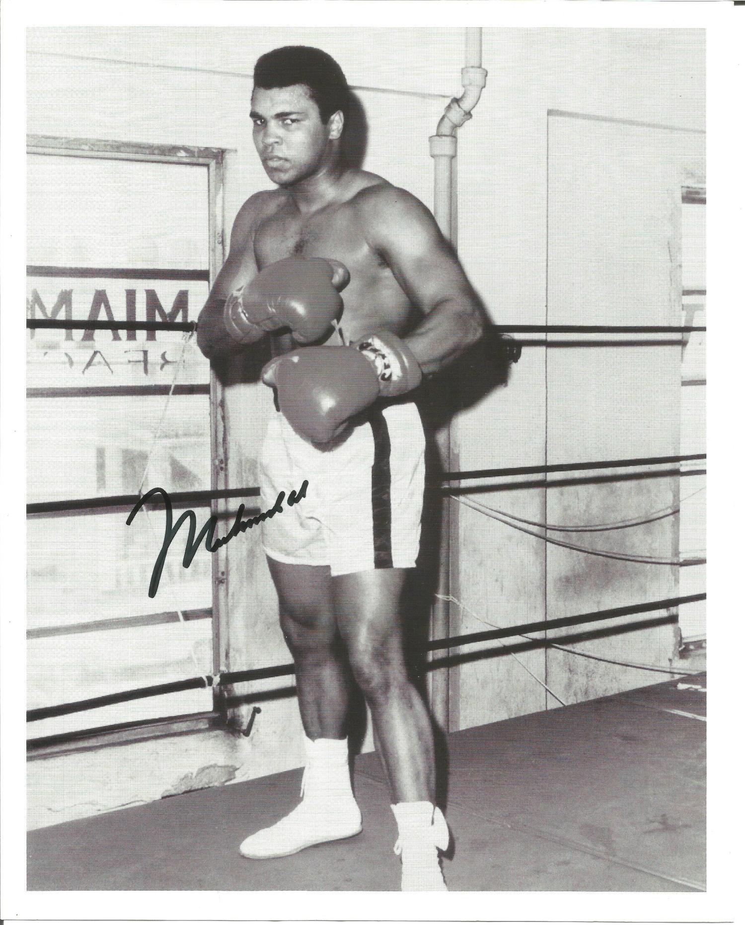 Muhammed Ali signed 10x8 b/w photo. Good Condition. All signed pieces come with a Certificate of