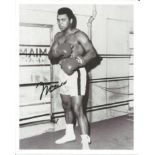 Muhammed Ali signed 10x8 b/w photo. Good Condition. All signed pieces come with a Certificate of