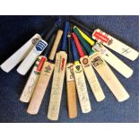 Cricket 11 miniature crickets bats over 60 signatures of international and county cricketers and