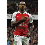 Football Theo Walcott 16x12 signed colour photo pictured in action for Arsenal. Good Condition.