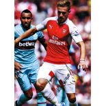 Football Aaron Ramsey 16x12 signed colour photo pictured in action for Arsenal. Good Condition.