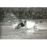 Autographed 12 x 8 photo football, TOM FINNEY, a superb image depicting the outside-right in a