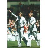 Autographed 12 x 8 photo football, BRIAN & JIMMY GREENHOFF, a superb image depicting the brothers in