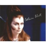 Catherine Schell genuine signed authentic 10x8 colour photo. Good Condition. All signed pieces